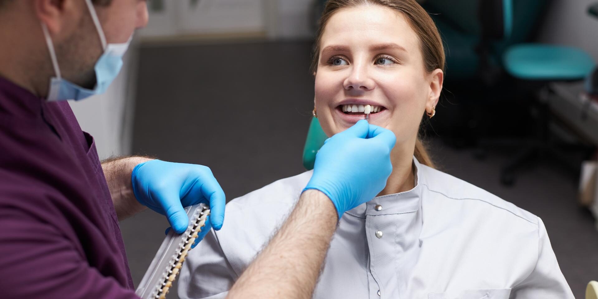 doctor-checks-the-color-of-tooth-according-to-the-2025-02-20-09-52-12-utc (1)